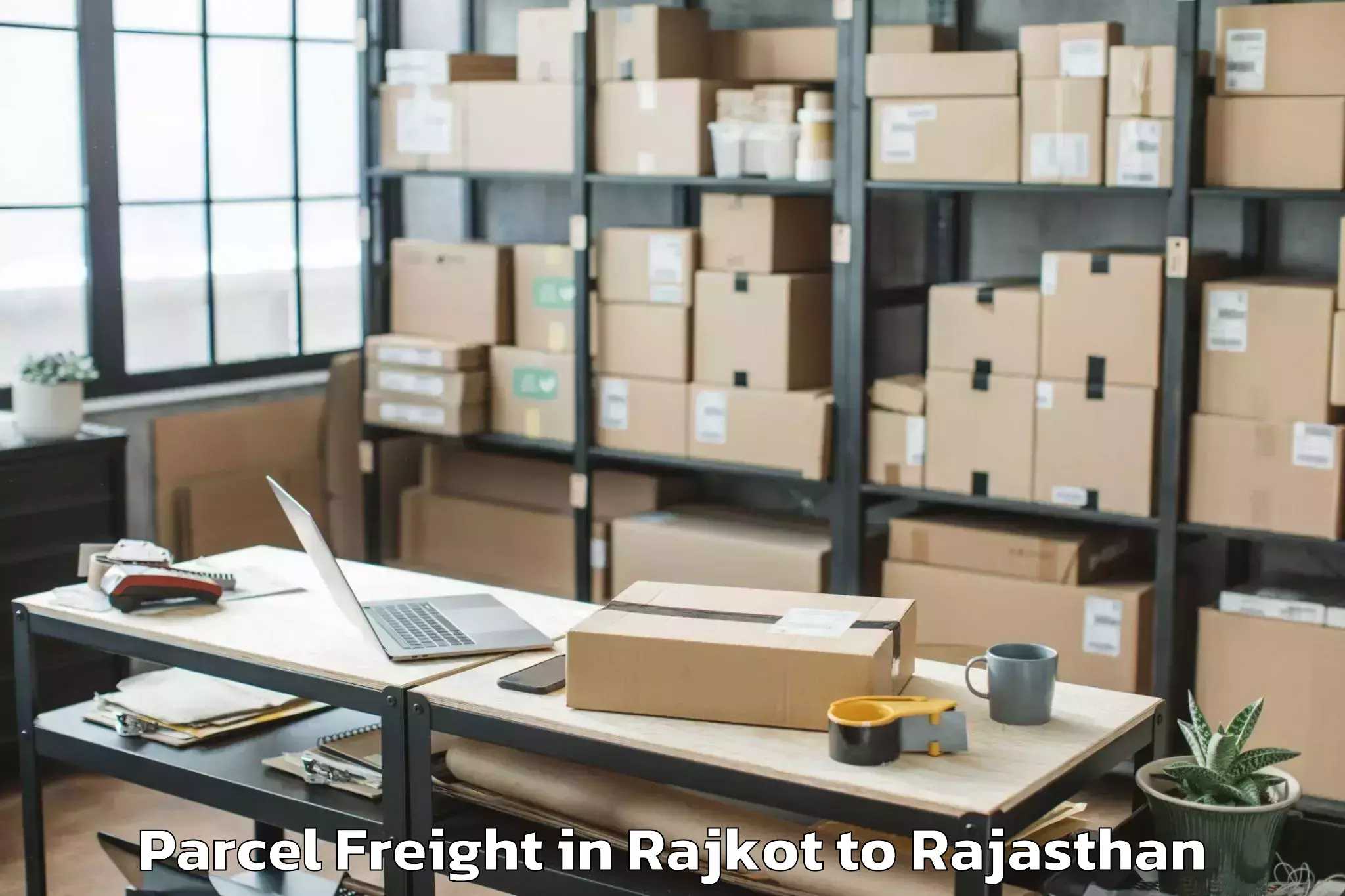 Easy Rajkot to Udpura Parcel Freight Booking